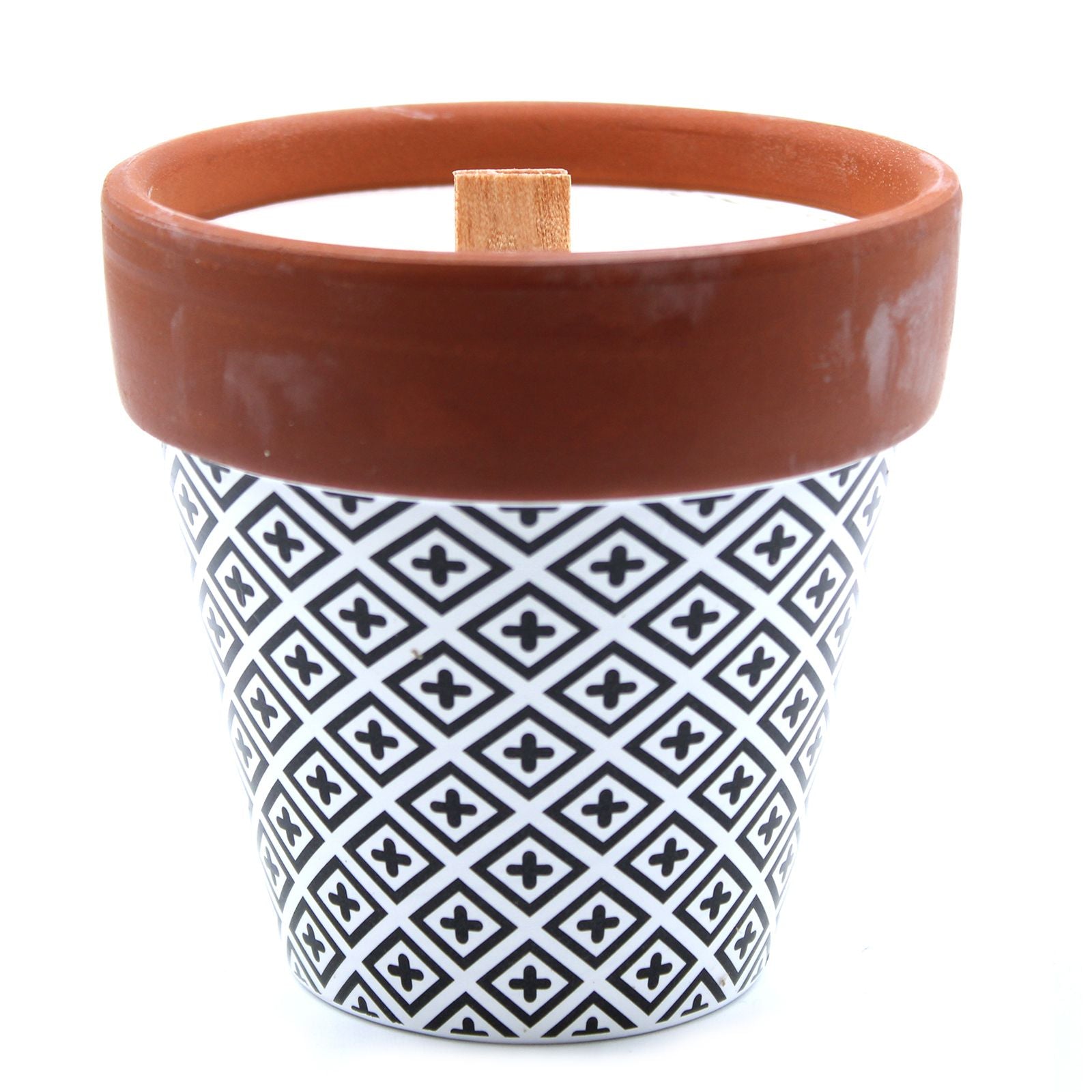 Terra cotta pot with a patterned design on a white background